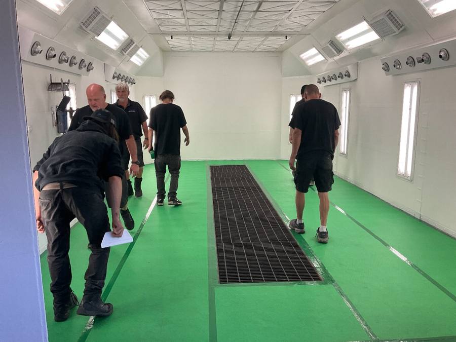 Crew working on a booth floor